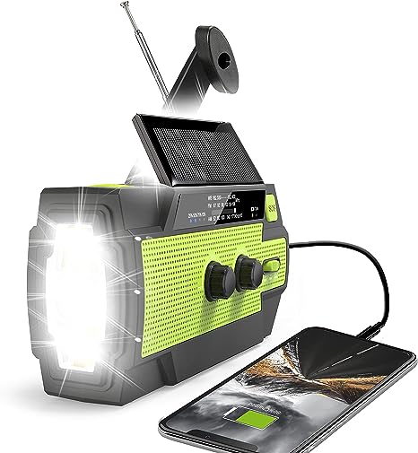 Green and black running snail radio charging a phone