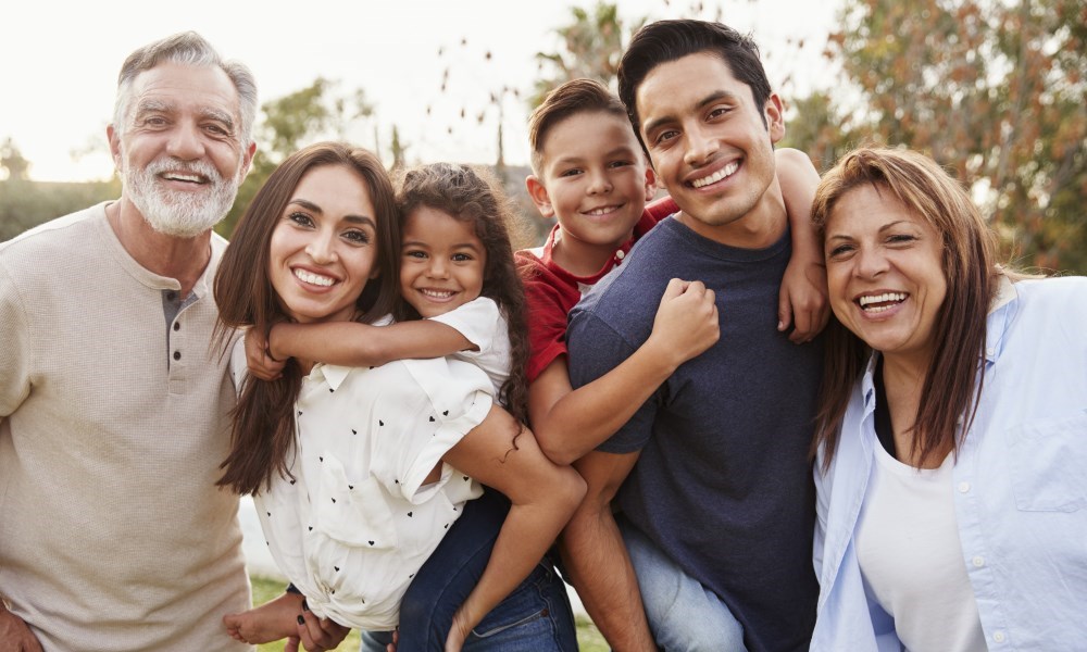 Family smiling at camera