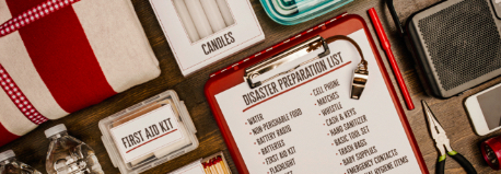preparedness checklist on clipboard, cables, first aid kit and other supplies